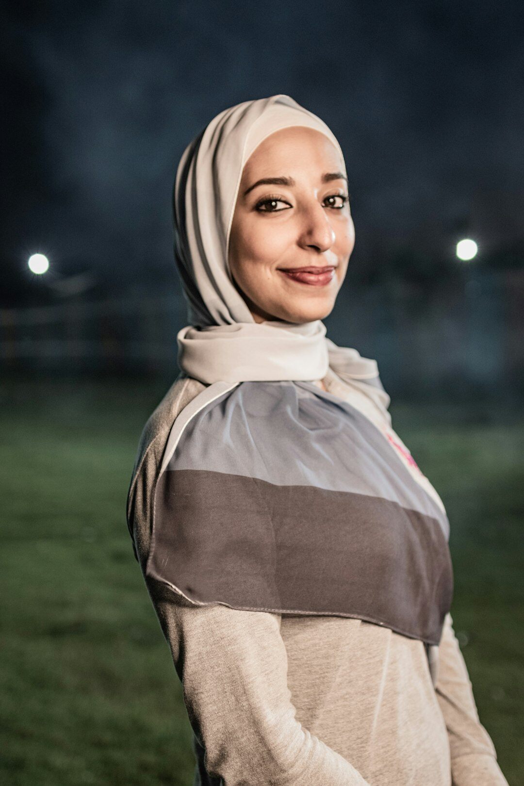 Turkish woman conflict resolution coach smiling in studio portrait