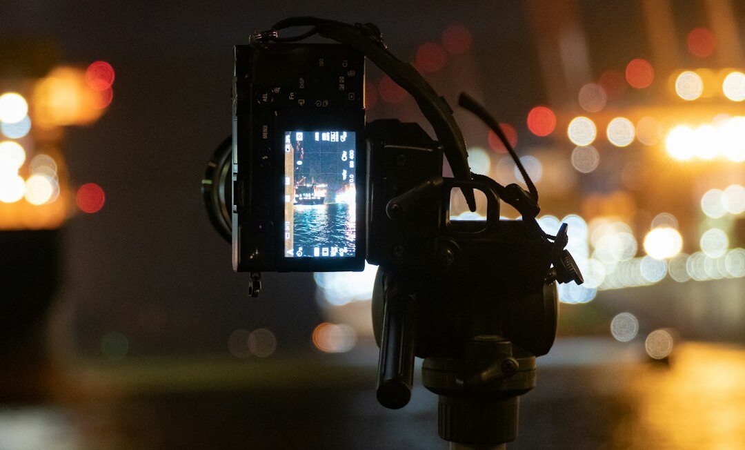 Professional TV studio cameras set up under bright lighting rig