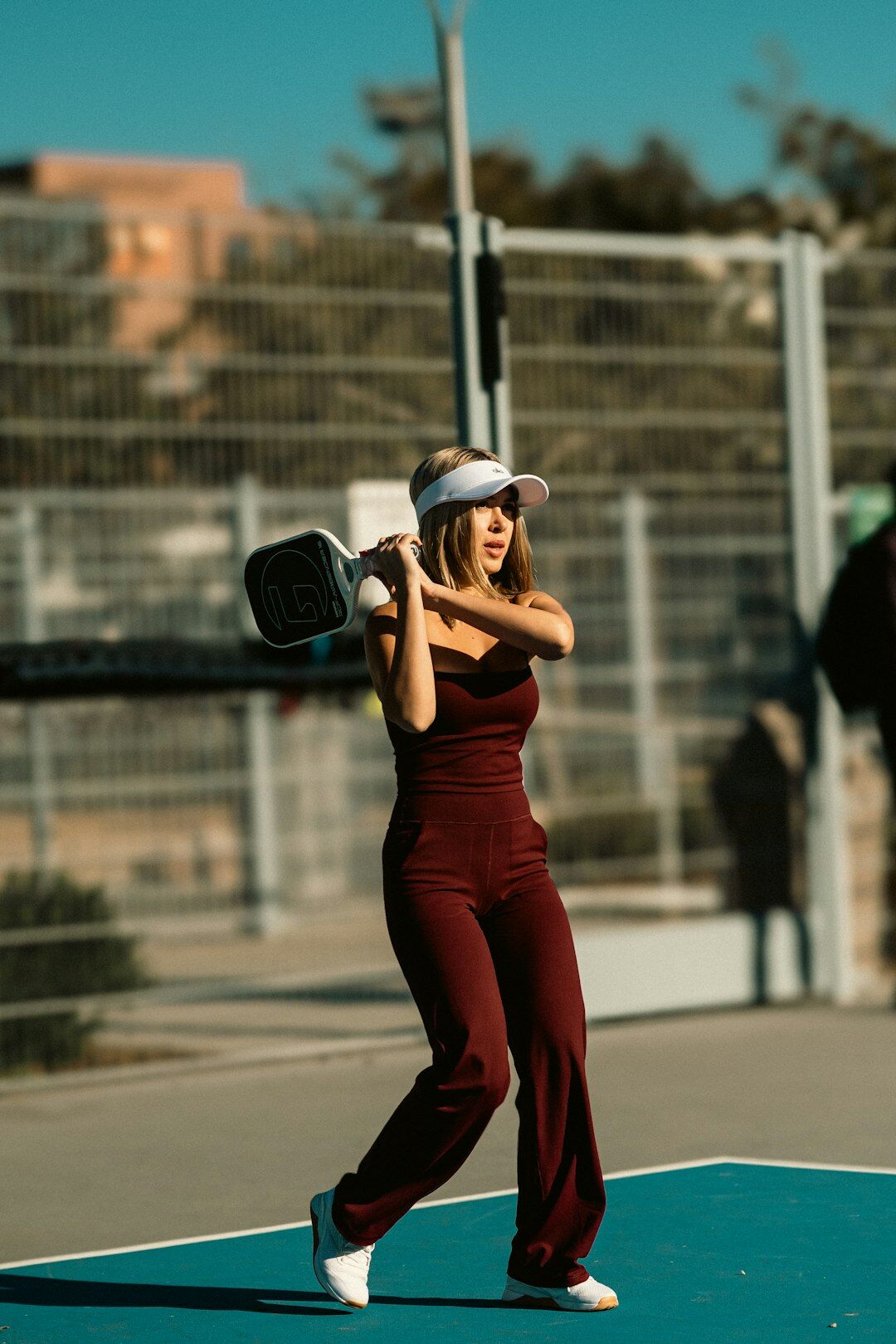 Turkish woman media trainer wearing a headset and professional attire